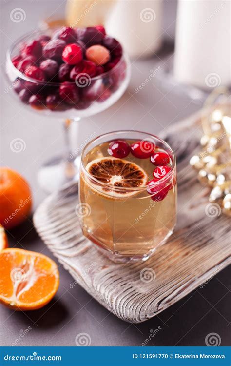 Christmas Hot Apple Cider with Cinnamon, Cranberry and Orange on a ...