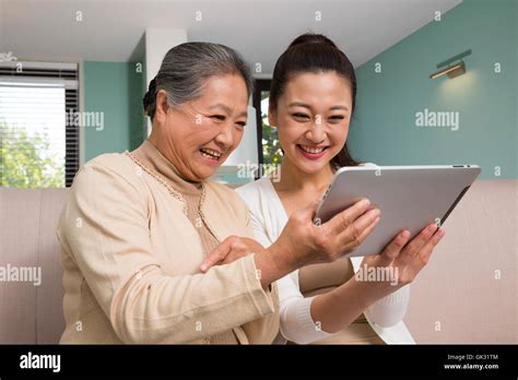 woman   young woman   living room stock photo alamy