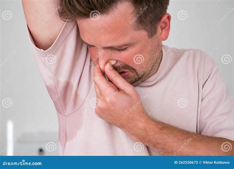 man  hyperhidrosis sweating  badly  armpit stock image