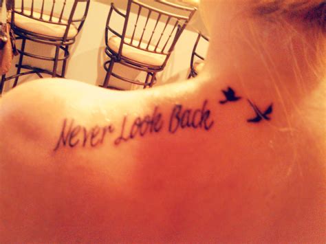 My new tattoo, "never look back" to me meaning move forward, look at ...