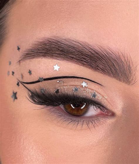 50+Makeup Looks To Make You Shine in 2023 : Graphic Liner + Lots of Stars