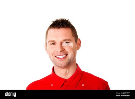 Cheerful handsome Polish man wearing red polo isolated on white ...