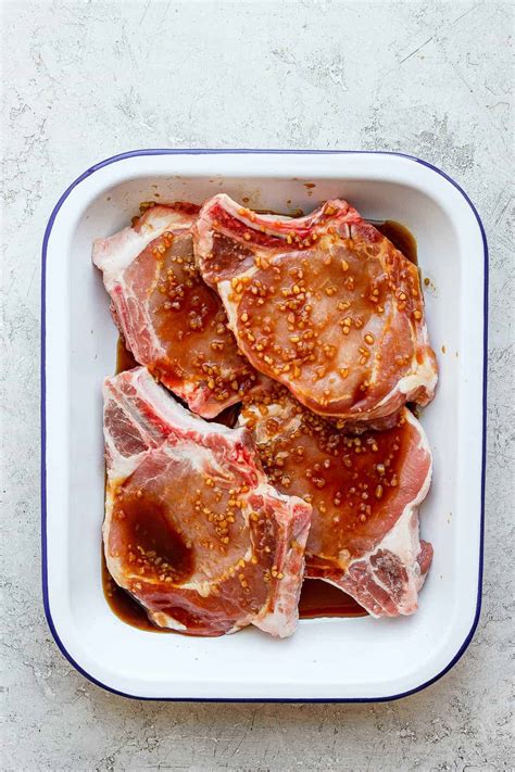 Juicy Pork Chop Marinade (5 Ingredients) - Fit Foodie Finds