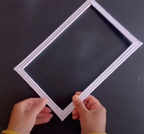 Woman shows how to make beautiful paper flower craft