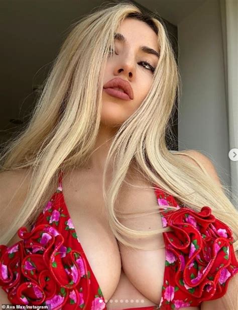 Ava Max flaunts her incredible figure in a patterned red and pink