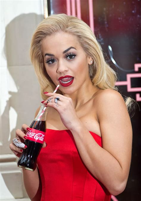 Rita Ora posts sexy snap as she celebrates 100 years of the Coca-Cola