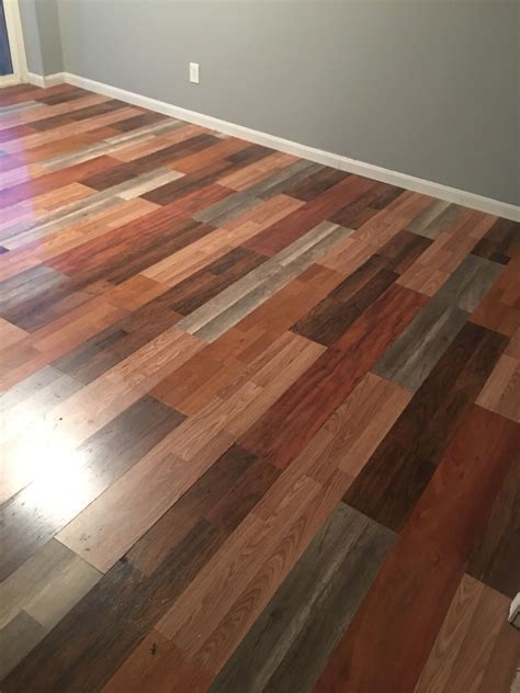 Mismatched laminate flooring | Diy flooring, Flooring, Wood effect ...