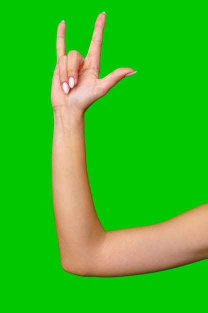 premium photo womans hand making  love  hand gesture