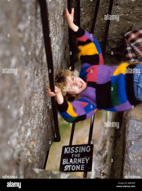 Kissing blarney stone blarney castle hi-res stock photography and ...