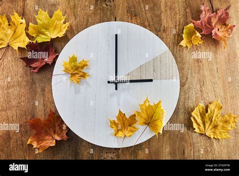 Daylight saving time. Fall Back time. Clock change back one hour Stock ...