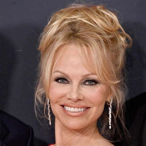 Pamela Anderson’s Signature Bombshell Hair: Try the Look