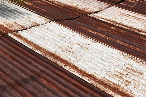 Rusted Corrugated Metal Roof Sheets in Various Shades of Brown Stock ...