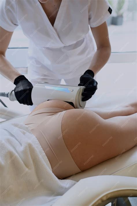 Premium Photo | Beautiful woman enjoys buttocks massage with endosphere