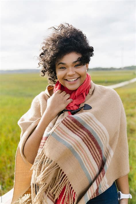 "Portrait Of Young African America Woman With A Big Smile" by Stocksy
