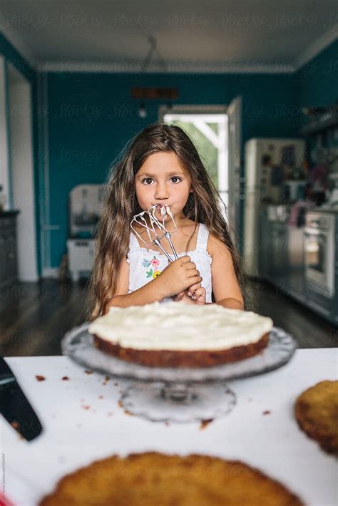 "Baking A Delicious Naked Cake" by Stocksy Contributor "Peter Meciar