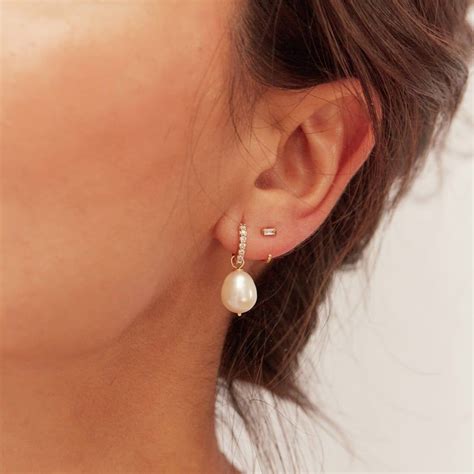 gold huggie pearl drop earrings artofit