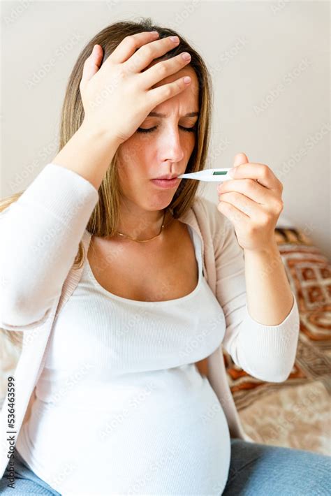 Pregnant sick fever thermometer. Pregnancy woman holding thermometer ...