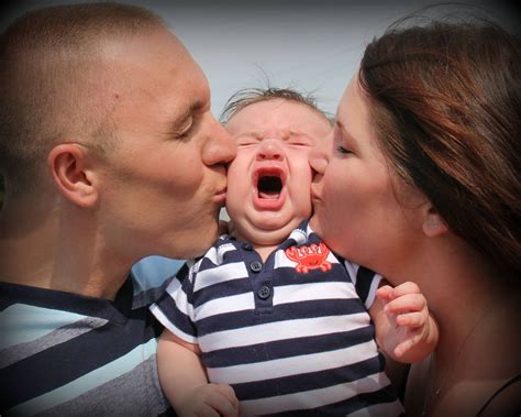 Download Mom And Dad Crying Baby Wallpaper | Wallpapers.com