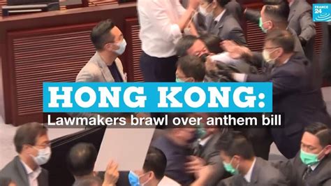 Hong Kong: Lawmakers brawl over anthem bill