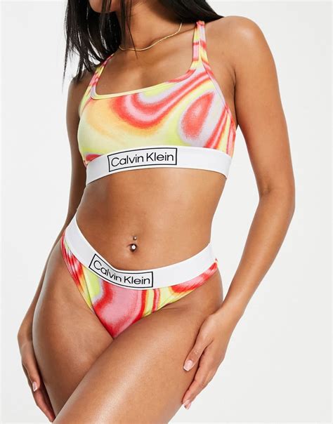 Заказать Трусы Трусики-стринги Calvin Klein Reimagined Pride с ...