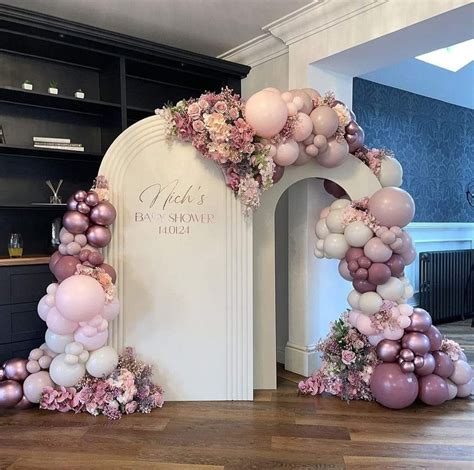 balloon  flower arch   balloon arch  flowers backdrop