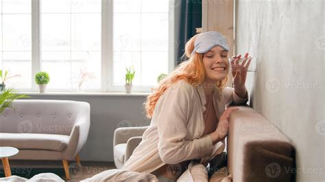 Curious Caucasian woman spy overhearing neighbor leaning to wall with