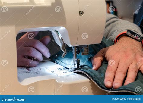 man   sewing machine   garment  repair work