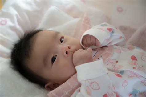 Premium Photo | Baby being held
