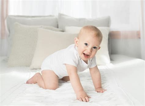 Baby On Bed · Free Stock Photo