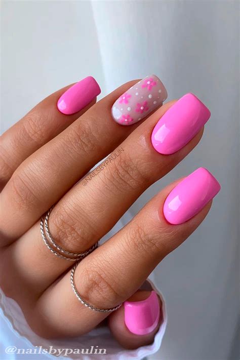 Stylish Belles — Short hot pink nails with accent floral nail art...