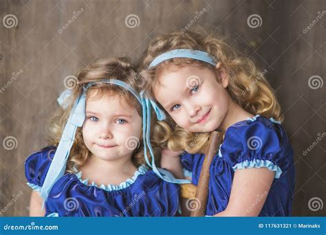 Little Curly Beautiful Twins Girls Stock Image - Image of girlsn ...