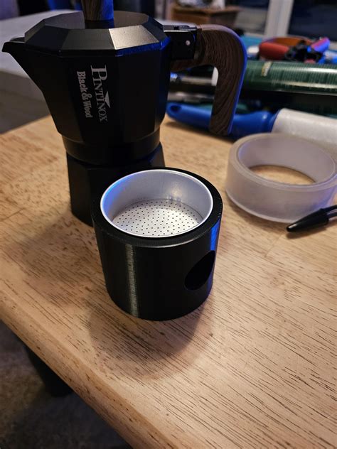 Basket holder for my Moka Pot, makes it easier to fill than holding it