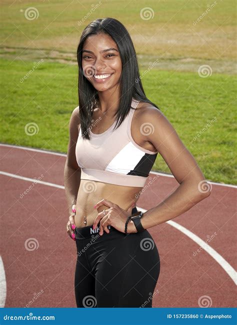 Gorgeous Black Female Fitness Model Outside on Track Stock Photo