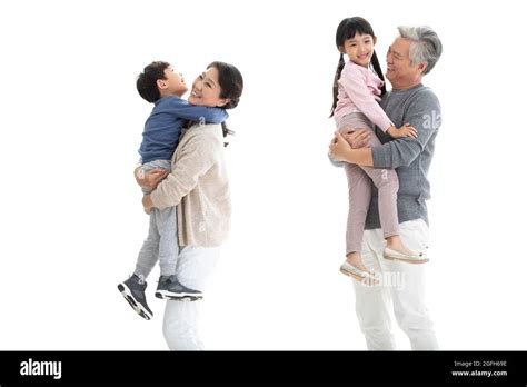 Happy grandparents and grandchildren Stock Photo - Alamy