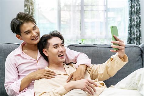 Guys Smile and Laugh in Love. Cute Male Homosexual Gay Couple Spend