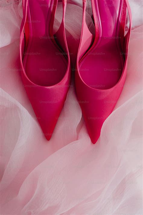 A pair of pink shoes with hearts on them photo – Valentines day Image