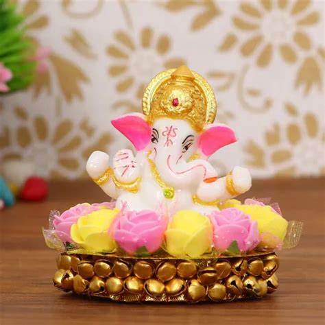 lord ganesha idol  plate designed  flowers pleasant