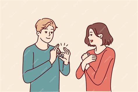 Lingua De Surdo E Mudo - Homem e mulher surdos-mudos estão conversando usando a linguagem de ...