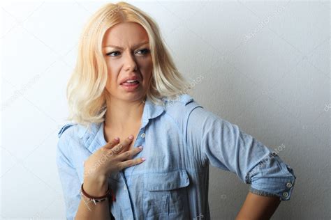 Woman with disgust on face Stock Photo by ©lenanet 127437544