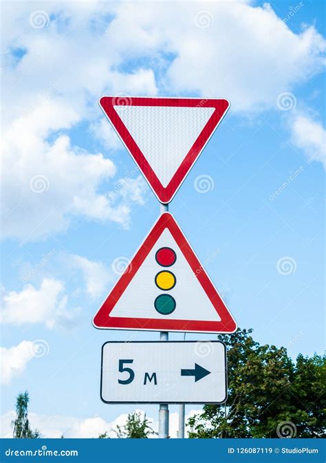 Give Way Road Sign and Traffic Light Stock Image - Image of helping ...