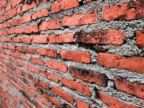 premium photo  brick wall   side  depth  field