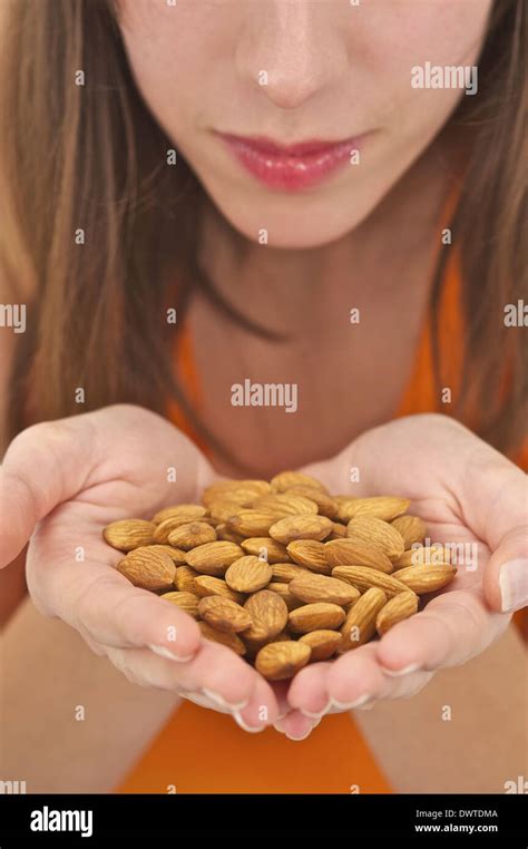 Food almond woman Stock Photo - Alamy