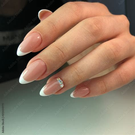 French manicure on the nails. French manicure design. Manicure gel nail ...