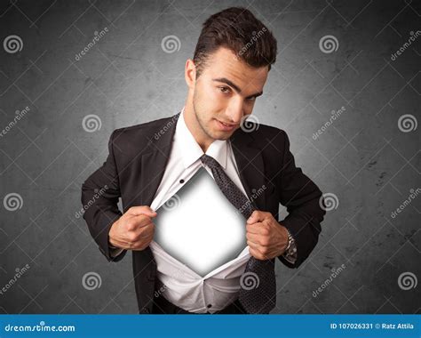 Businessman Tearing Off His Shirt with White Copyspace on Chest Stock