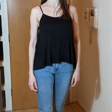 This cami is in very good condition. Black Cami from... - Depop