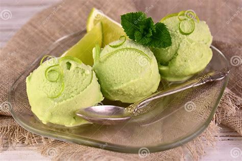 Scoop of Lime-vanilla Ice Cream Decorated with Mint Isolated on White ...