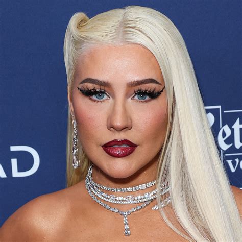 Christina Aguilera Wore A Daring Red Lace Corset Top With A Leather ...