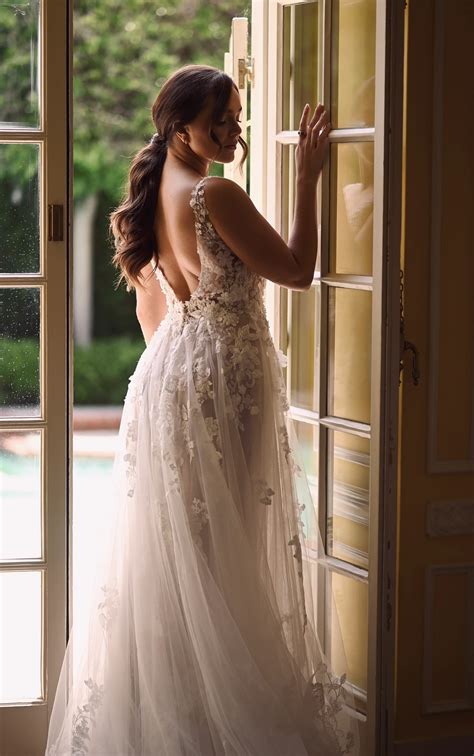 Ethereal A-Line Bridal Gown adorned with Romantic Floral Lace and