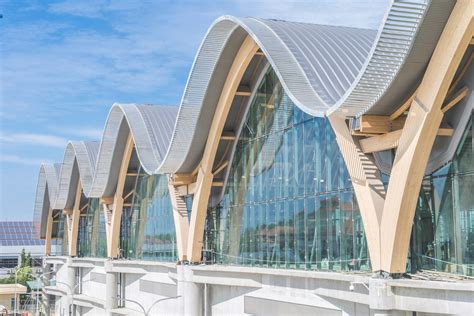 Timber arches support wavy roof of Mactan Cebu International Airport in