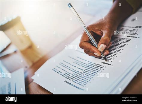combing   fine print  businesswoman completing paperwork